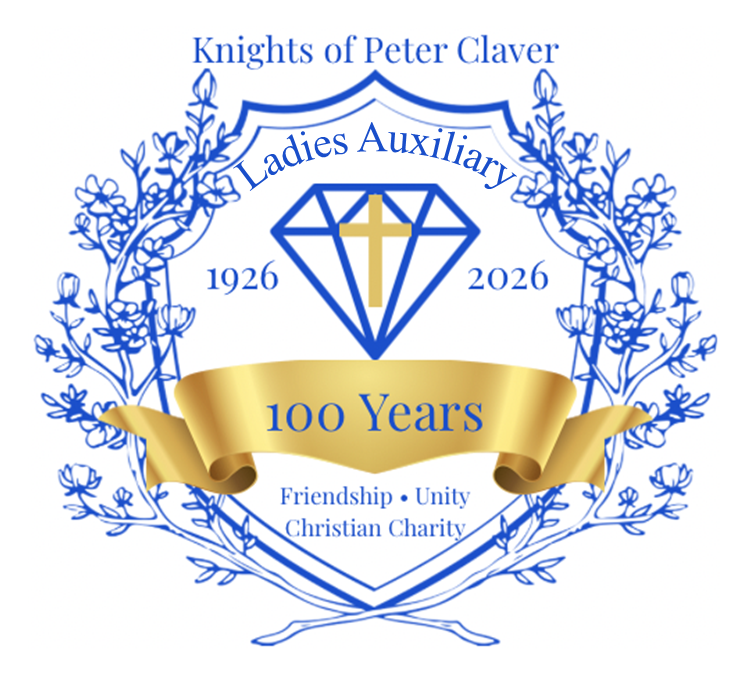 Volunteers pose in front of apple box